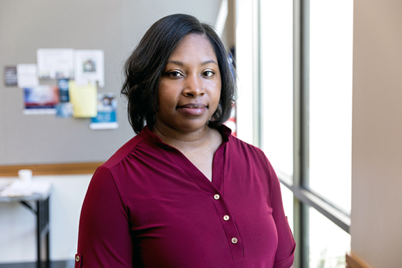 Adult woman looking at the camera with a neutral expression