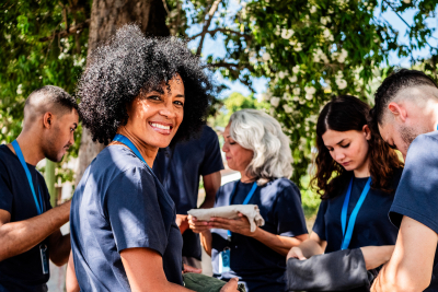Portrait of mature volunteer woman outdoors photo