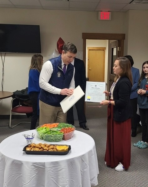 Senator Fattman delivers an official citation