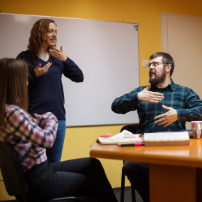 Adults learning sign language