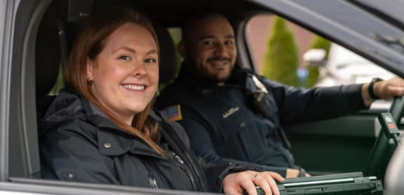 Photo of clinician and officer in cruiser